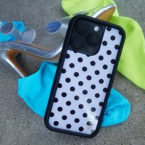 Wildflower iPhone 14 Pro white and black polka dot case